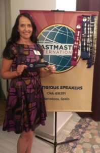 Dr. Katja Rusanen with her book Your Spiritual Curriculum